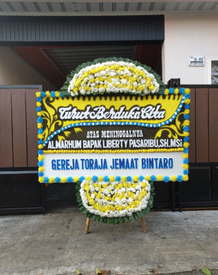 Papan Bunga Duka di Yenggelo